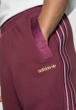 Adidas Originals SHADOW STRIPE COLLECTION SLIM - Tracksuit Bottoms - Victory Crimson -Adidas Originals Shop ba359c6e6f24450aa3ef12aca41f95f3