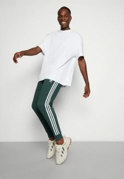 Adidas Originals 3-STRIPES PANT UNISEX - Tracksuit Bottoms - Mineral Green -Adidas Originals Shop bd0c801f593a44338561df5cde49ffba