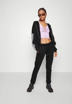 Adidas Originals TRACK PANT - Tracksuit Bottoms - Black -Adidas Originals Shop bd181ccc68c4480fae39589e1a35425f