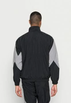 Adidas Originals LIGHTNING - Training Jacket - Black -Adidas Originals Shop c07314a9a25e476d9a06846a83141cb1