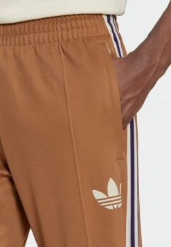 Adidas Originals 70S PACK STRIPED - Tracksuit Bottoms - Brown Desert -Adidas Originals Shop c4adb9e9d1a54629be14173b45dbff8b