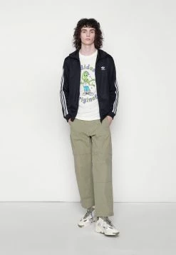 Adidas Originals BECKENBAUER UNISEX - Training Jacket - Black -Adidas Originals Shop c74ef6a53d5547f8853c0b7f0e716fc2