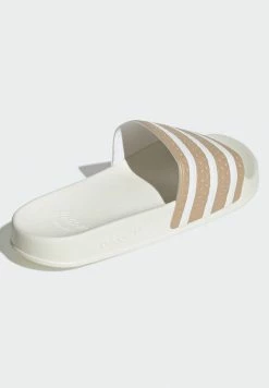 Adidas Originals ADILETTE UNISEX - Mules - Magic Beige/ftwr White/off White -Adidas Originals Shop c9f3af5417f84c76a5e56ff16d1ab5b0