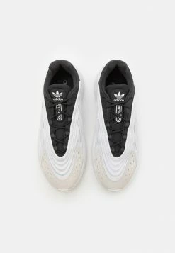 Adidas Originals OZELIA UNISEX - Trainers - Footwear White/core Black -Adidas Originals Shop cec8079132de47a49c1f47b2f3ed8b1b