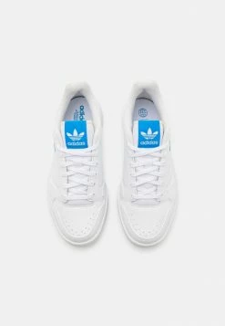 Adidas Originals NY 90 J UNISEX - Trainers - Footwear White/blue Rush/ecru Tint -Adidas Originals Shop d72acedd36b64cacba6282ae46a4477f