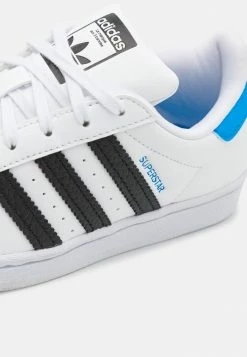 Adidas Originals SUPERSTAR C UNISEX - Trainers - Footwear White/core Black/blue Rush -Adidas Originals Shop dc0c4c18abba4670b9f04bea77df12c0