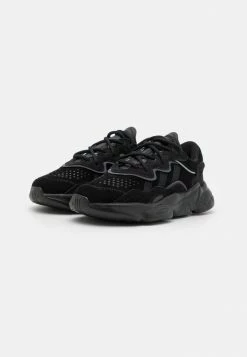 Adidas Originals OZWEEGO UNISEX - Trainers - Core Black/night Metallic -Adidas Originals Shop e2111b8bcd2b4625ae84b6ca5507a53a