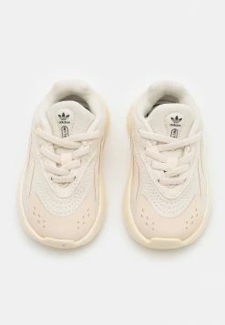 Adidas Originals OZELIA UNISEX - Trainers - Ecru Tint/core Black -Adidas Originals Shop e53c4dabe7994e61afbe6253247883f2