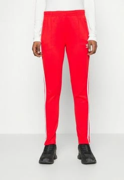 Adidas Originals SUPERSTAR - Tracksuit Bottoms - Vivid Red