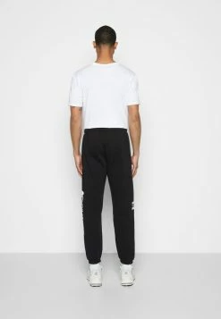 Adidas Originals ORIGINALS - Tracksuit Bottoms - Black -Adidas Originals Shop eada473297184588ae8bd5676d31062e