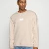 Adidas Originals SILICON CREW UNISEX - Sweatshirt - Halo Ivory