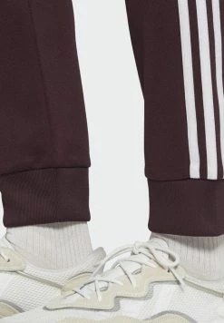 Adidas Originals ADICOLOR CLASSICS SUPERSTAR - Tracksuit Bottoms - Shadow Maroon/white -Adidas Originals Shop f69db673a9494c6eb1fd1731bd2b5103